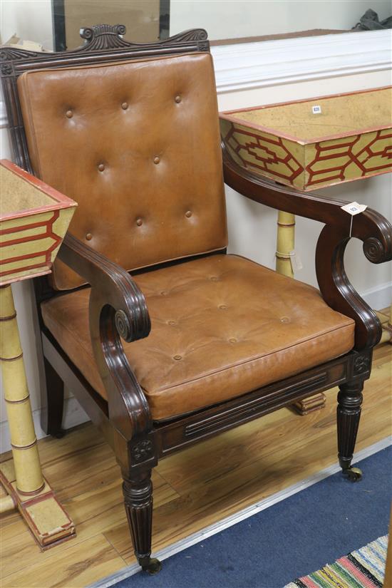 A leather button back bergere chair